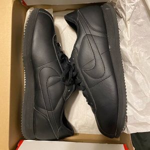 All black leather cortez